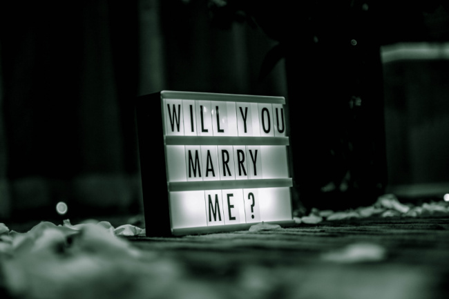 sign asking will you marry me wedding proposal