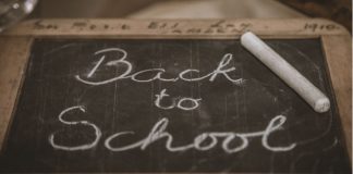 chalkboard that says back to school written on it