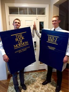 two people dressed at the book of mormon and bible costume for halloween 