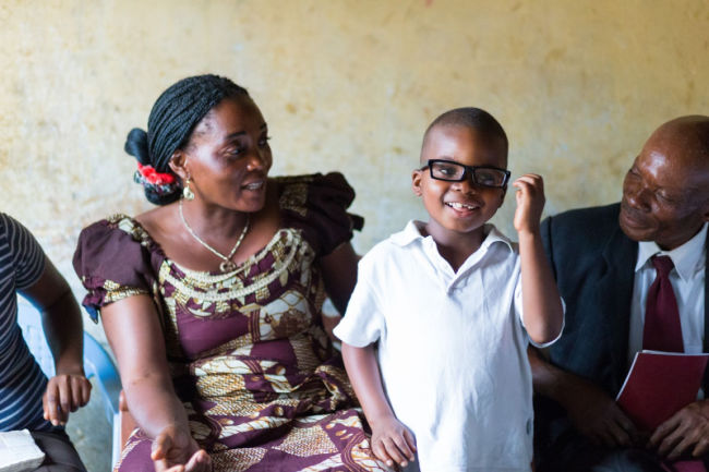 family from the congo doing a scripture study