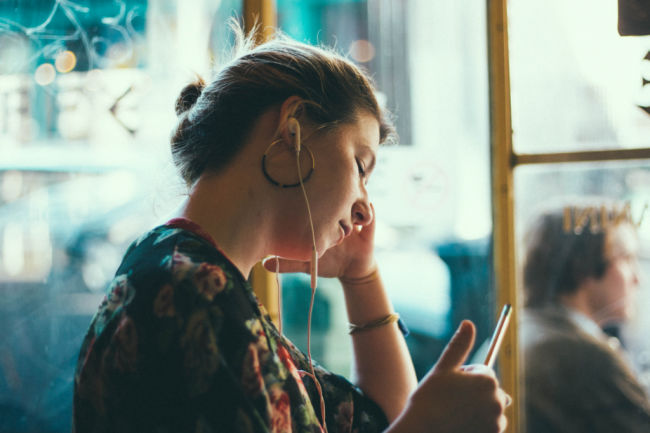 woman listening to latter-day saint podcasts